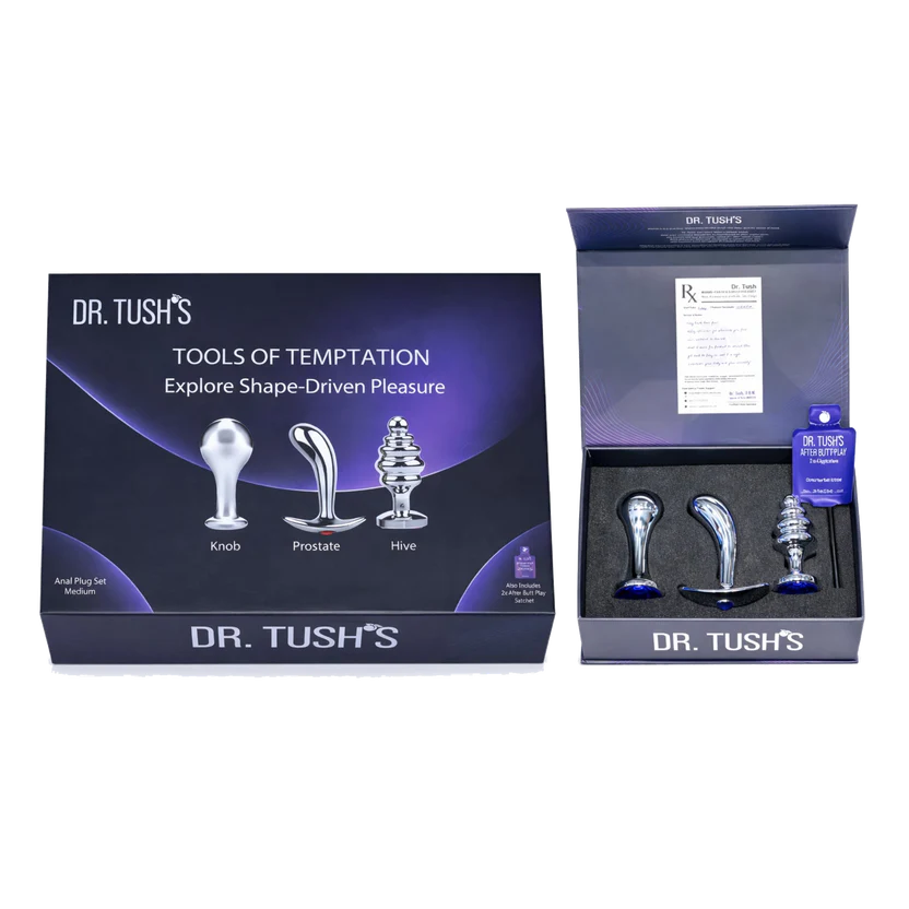 Dr. Tush's 'Tools of Temptation' adult novelty product set, showing the retail packaging box alongside the open box containing three silver-colored metal prostate and hives plugs with blue accents.
