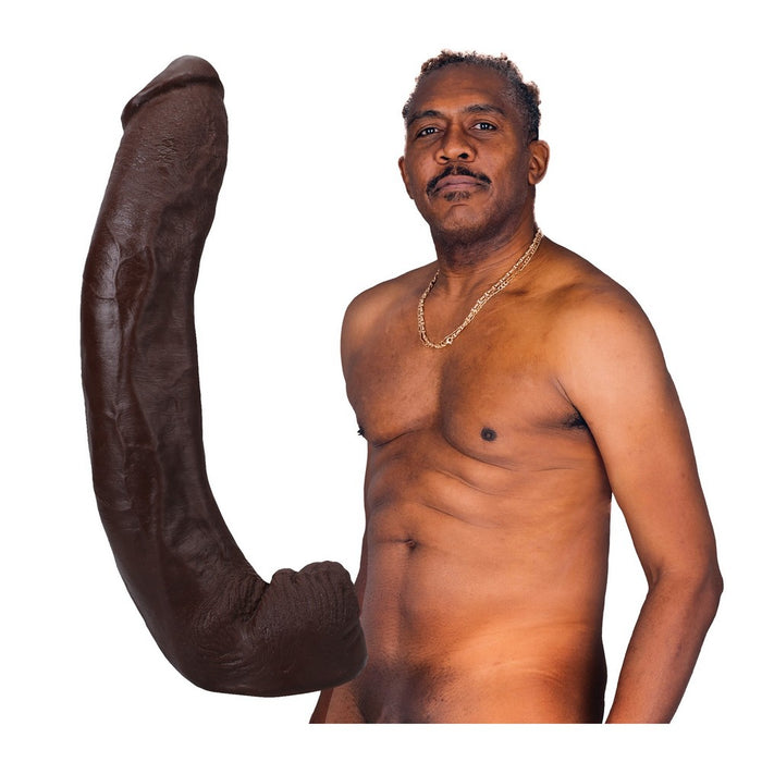 male star dredd with molded dildo beside him on a white background