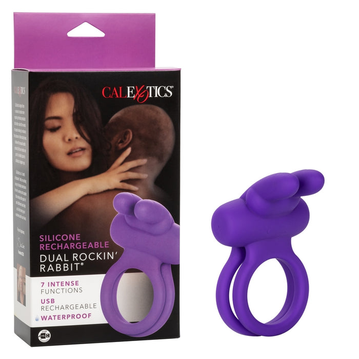 purple silicone rechargeable vibrating double cock ring with rabbit cliroal simulator next to cal exotics box