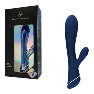 Blue silicone vibrator with clitoral stimulator with packaging on a white background