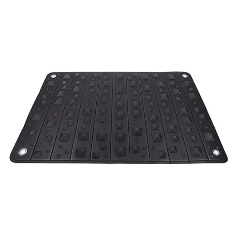 Black rubber mat with textured surface on a white background