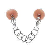 Silver tuggable clover nipple clamps on nipples on a white background