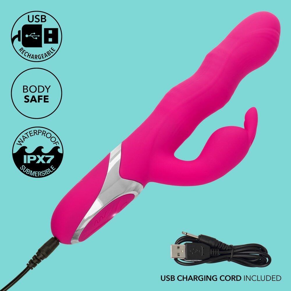 Pink USB rechargeable vibrator with charging cord on a teal background