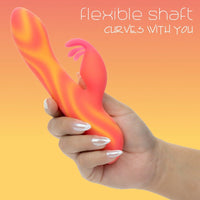 Hand holding a colorful flexible vibrator against a gradient background with text.