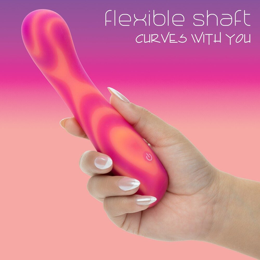 Hand holding a pink and red flexible vibrator product with a gradient background