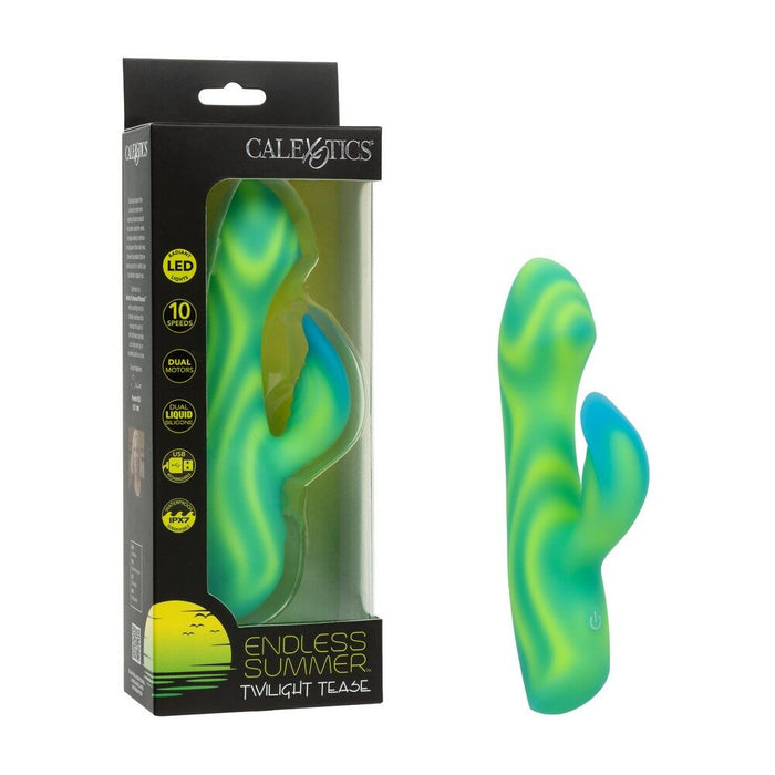Green and blue silicone vibrator with packaging displaying 'Calexotics' branding.
