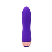 Purple and rose gold envy bullet on a white background