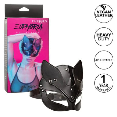 a black cat mask with open eye holes and silver studs, shown next to its dark pink display box