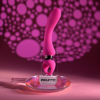 pink g-spot vibrator with ring holder on stand