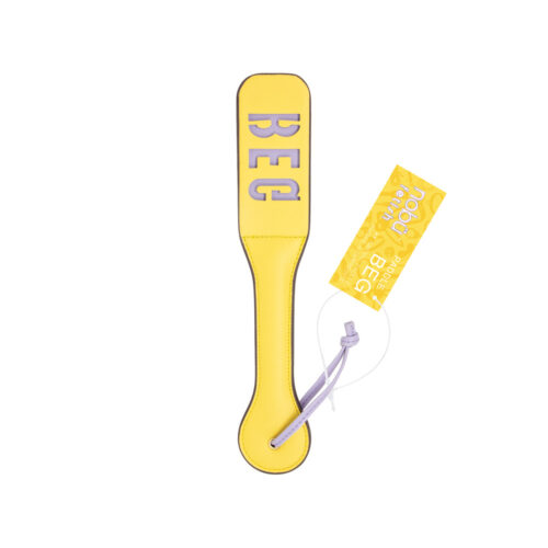 A bright yellow paddle board with the word 'BEG' printed vertically in light purple on the top, shown with a matching yellow hangtag on a plain white background.