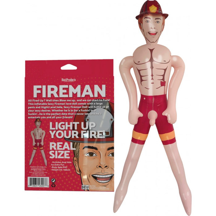 beige fireman doll with red shorts and hat 