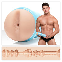 malik delgaty in black under wear holding a replica fleshlight masturbator with texture