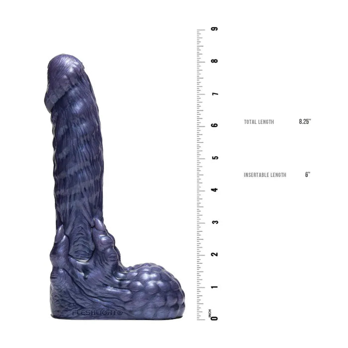 fleshlight fantasy predator dildo with a ruler on a white background
