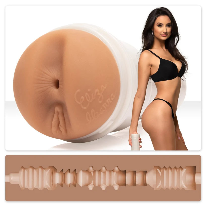 adult star eliza ibarra standing beside molded butt fleshlight masturbator with texture