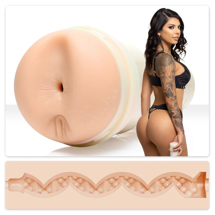 adult star gina valentina standing beside molded butt fleshlight masturbator with texture