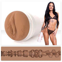 adult star ryan redi wearing black bra & panty holding a fleshlight masturbator case, standing beside molded vagina fleshlight masturbator with texture 