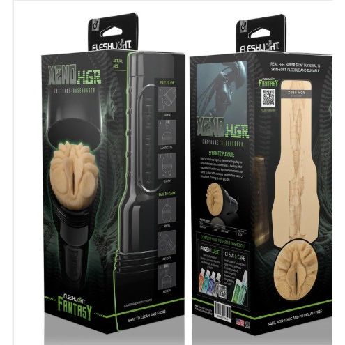 Two retail boxes for the Fleshlight Xenomorph Original Collection, showing the black and green packaging with product imagery of a black stroker and beige alien-shaped insert, on a white background.
