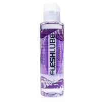 A bottle of FleshLube Silicone Base Personal Lubricant, featuring a purple and white label with a clear cap, shown against a plain white background.
