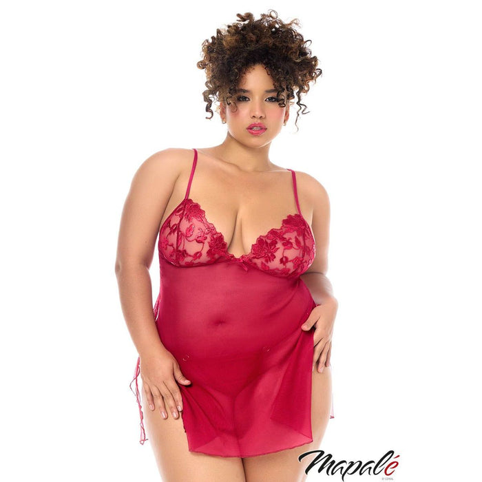 Woman wearing a red satin nightgown with lace details on a white background, featuring the brand 'Mapale'.