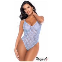 brunette female wearing floral lace teddy in blue, front view