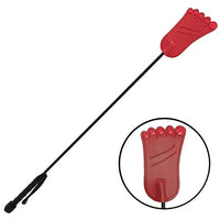 red foot riding crop on white background