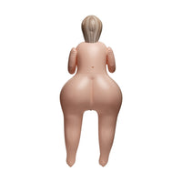 An inflatable adult sex doll with a realistic flesh-toned body, blonde wig, and black hair accessories, shown from behind on a solid white background.