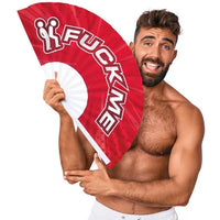 Man holding a red fan with 'FUCK ME' text against a white background