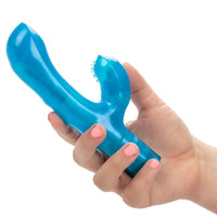blue vibrator with clit and g spot curve held in a hand