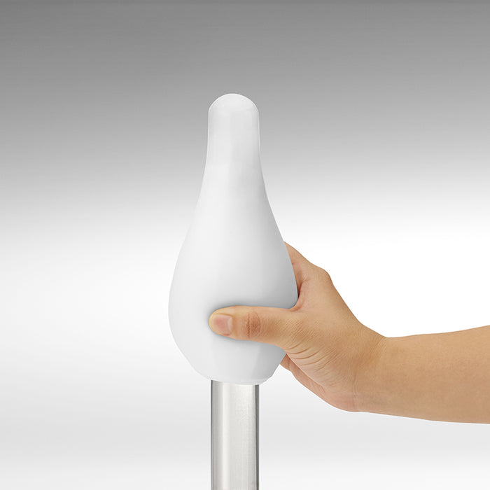 white textured mastubator being demonstrated how stretchy it is
