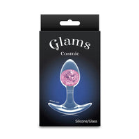 Glam's Cosmic product packaging with pink gem and clear base on a black background