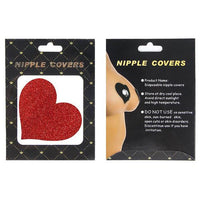 Red glittery heart-shaped nipple cover with packaging on a white background