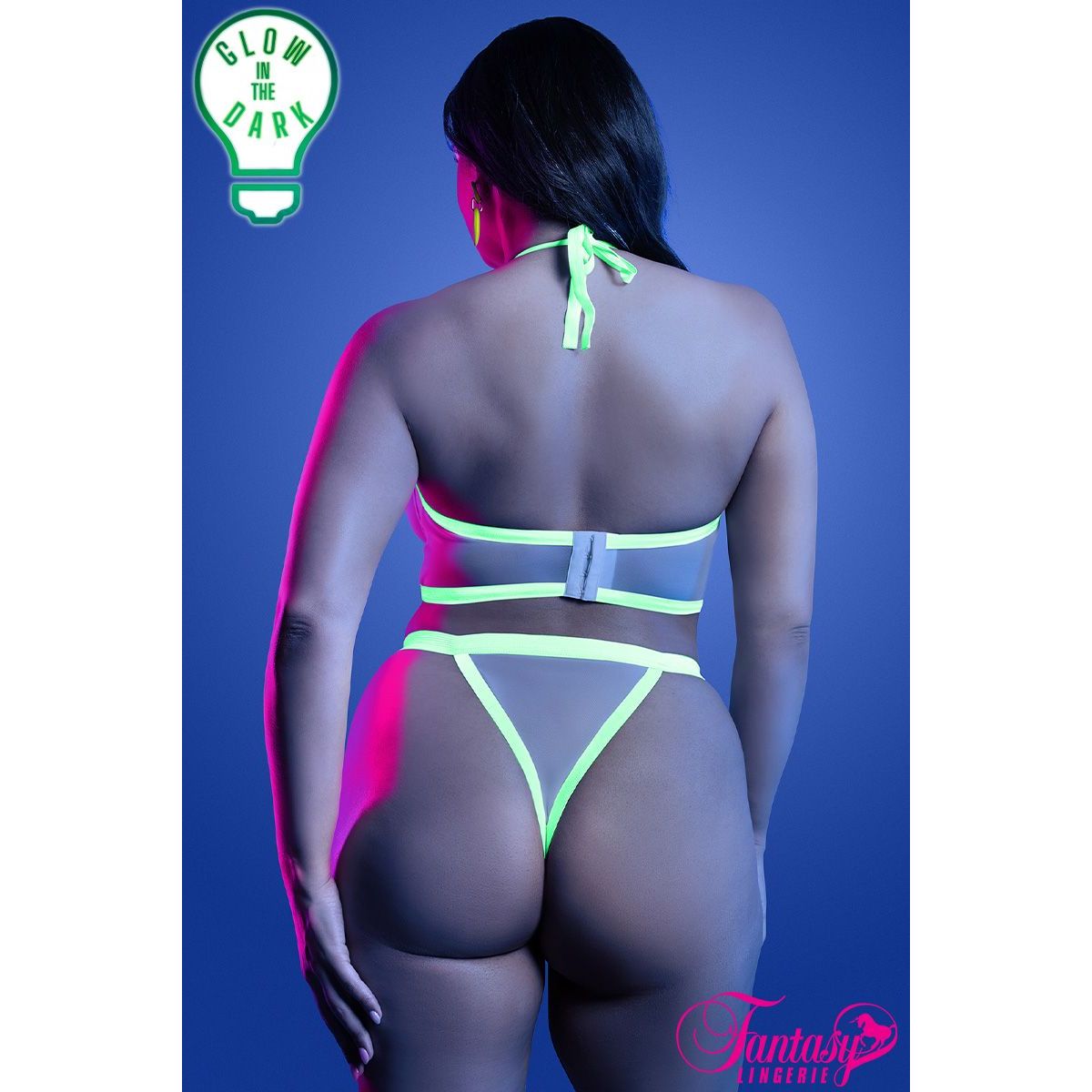 Person wearing a neon green bikini with 'Glow in the Dark' text and 'Fantasy Electric' branding.