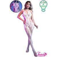Woman wearing a lace bodystocking with a glow-in-the-dark feature, branded 'Fantasy Lingerie'.