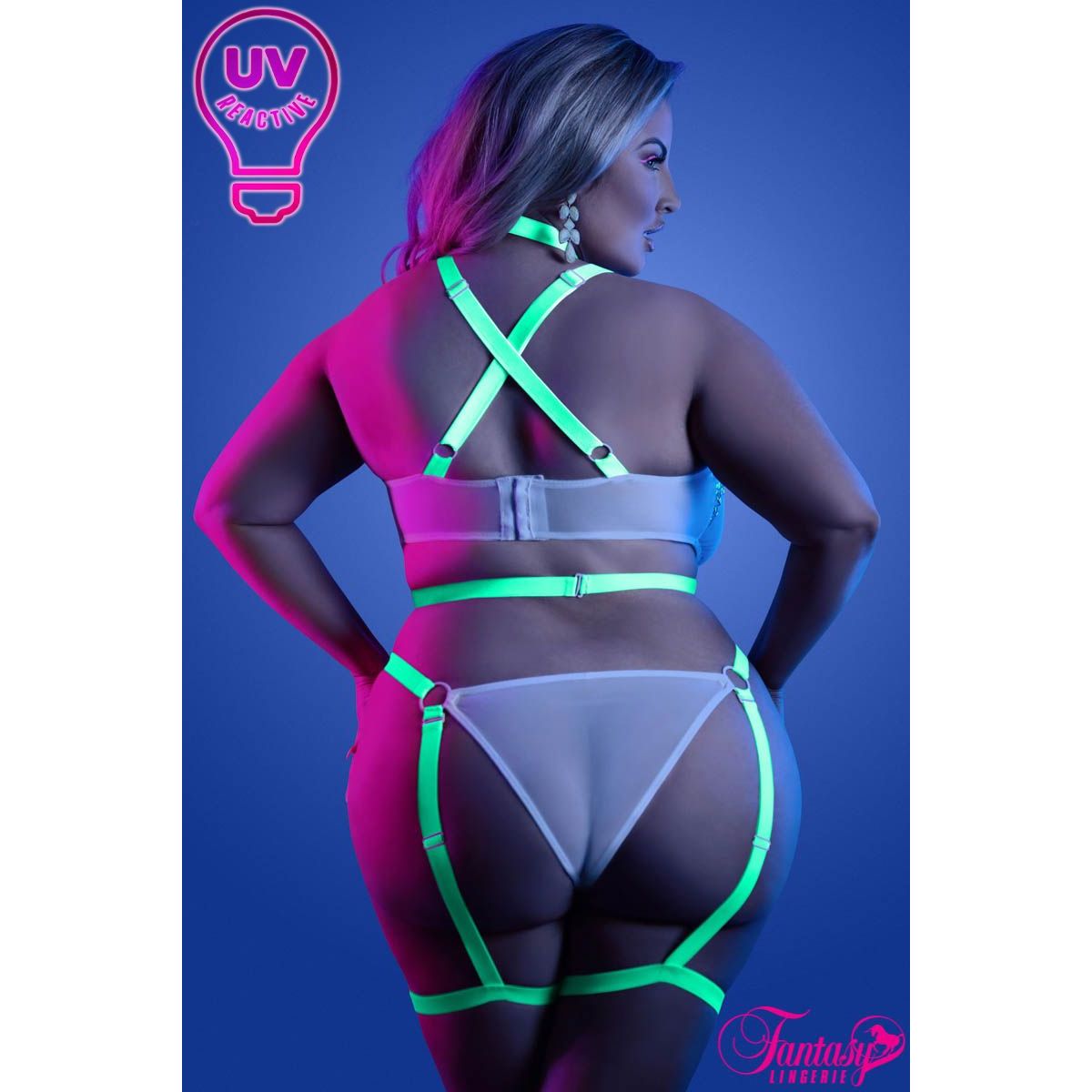 blonde female in uv caged teddy back view