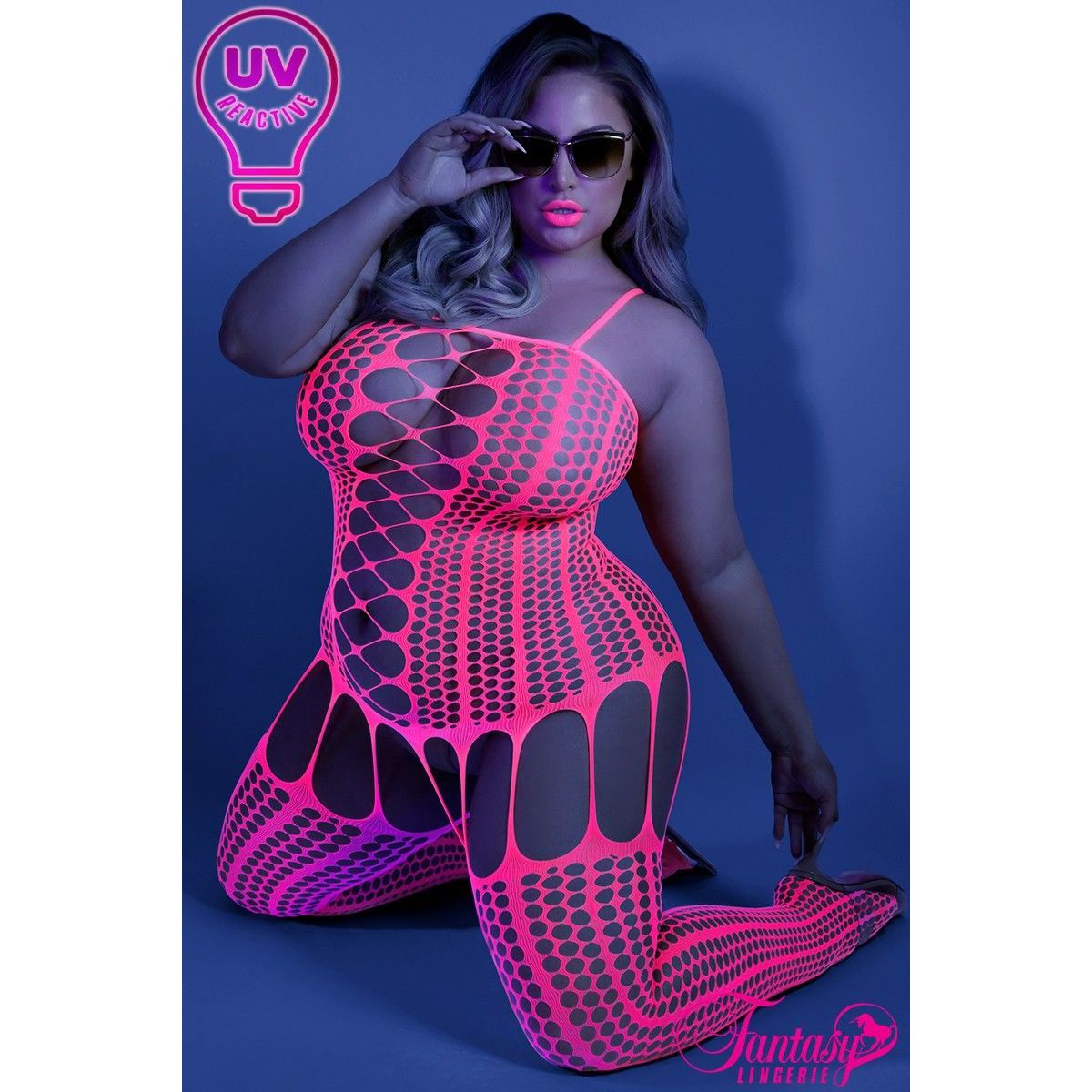 blonde female on knees in pink honeycomb bodystocking front view