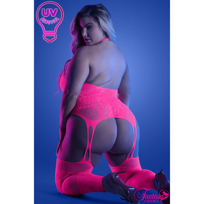 blonde female on knees in fishnet & lace bodystocking back view