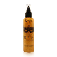 Orgie glow shimmering body oil bottle on a white background