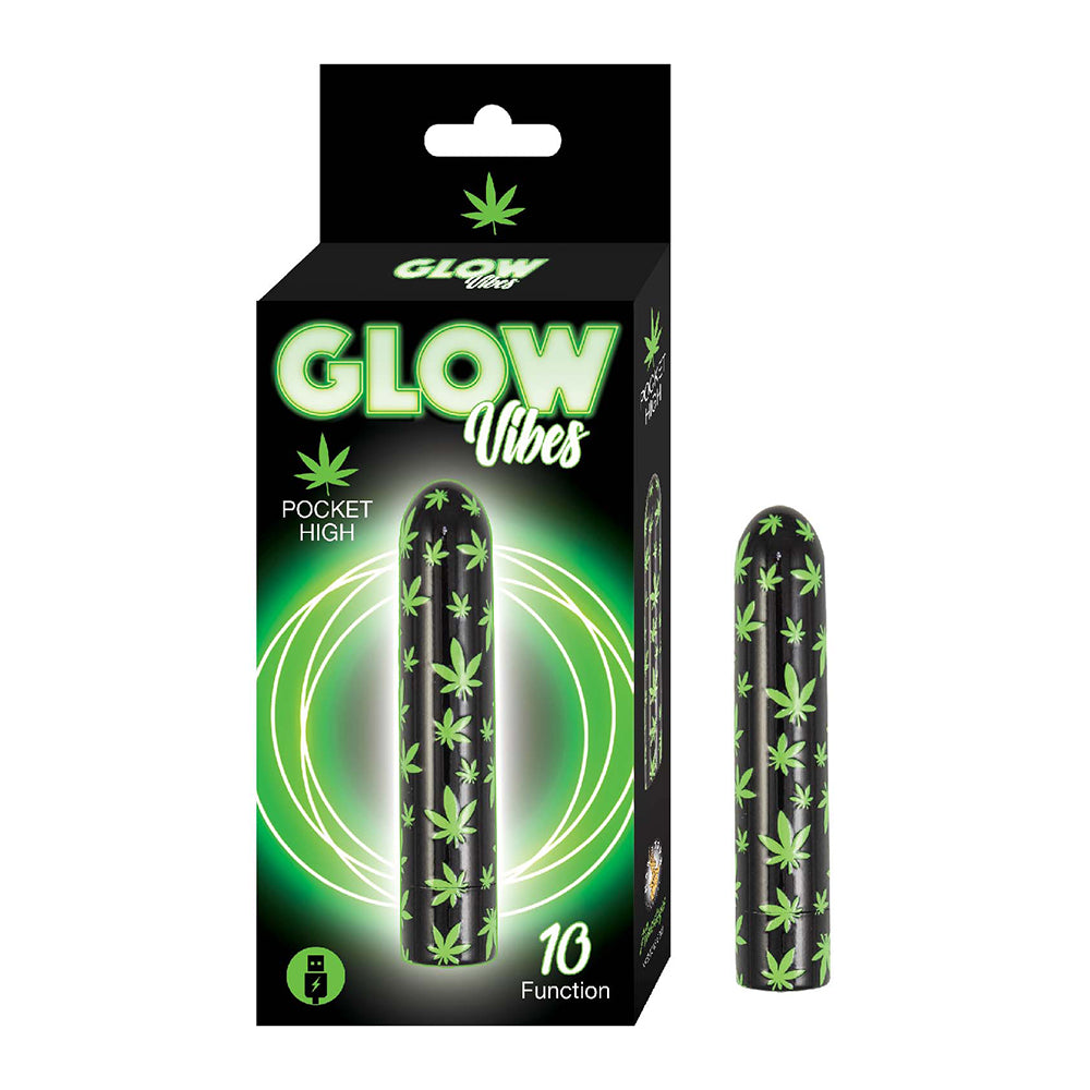black vibrator with glow in the dark weed leafs beside box packaging