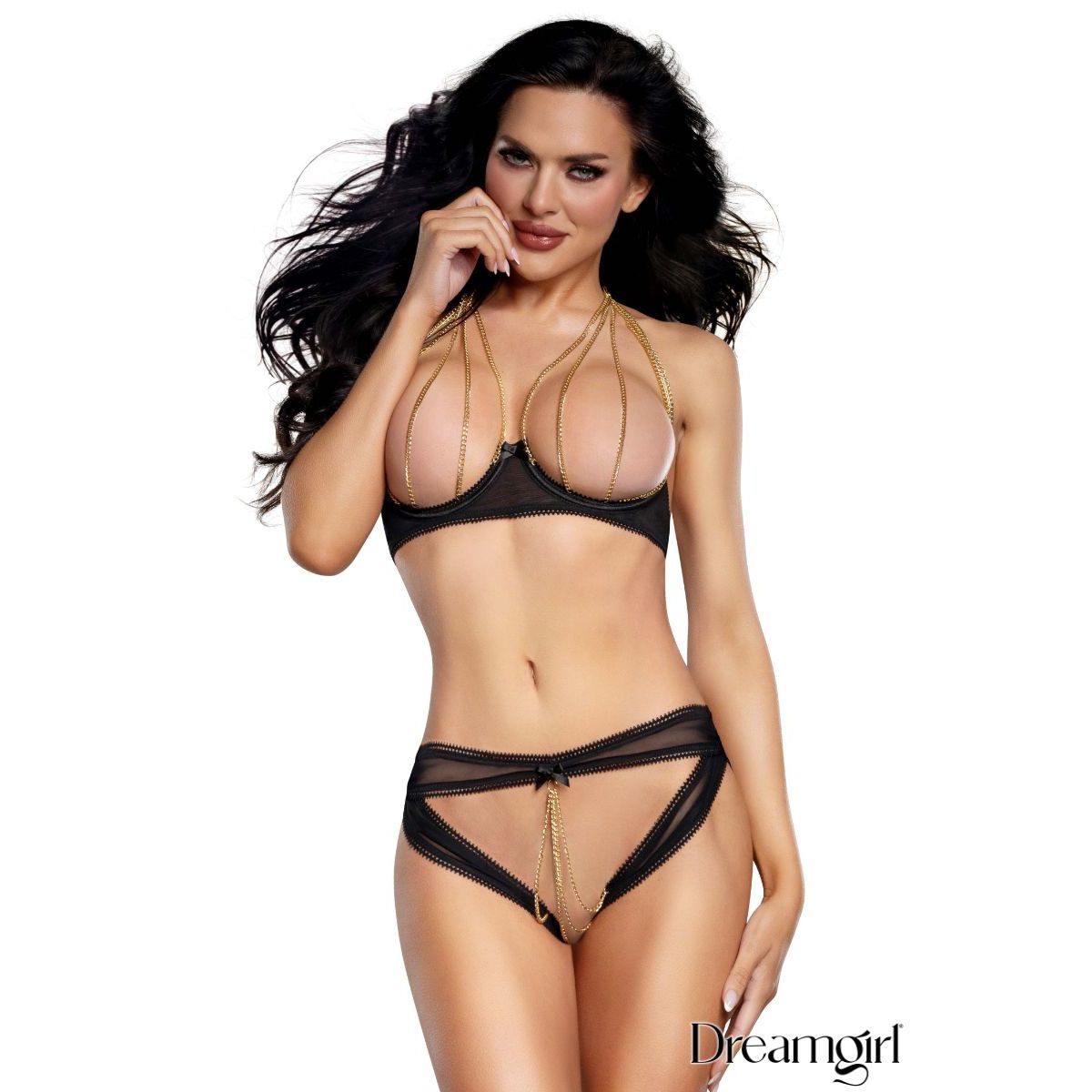 woman wearing a bikini with openings with gold chains