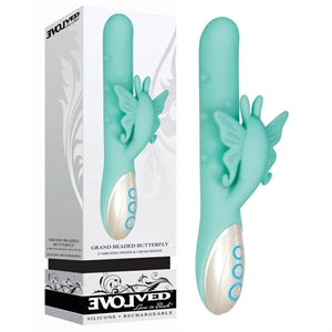 turquoise vibrator with butterfly clit stim on box 