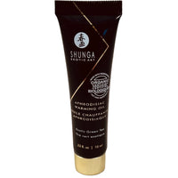 Shunga Aphrodisiac green tea Warming Oil packaging on a white background
