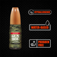 Camouflage bottle labeled 'GUN OIL' with hypoallergenic, water-based, and paraben-free icons on a black background.