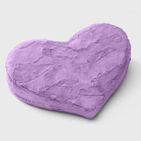 Purple heart-shaped pillow on a white background