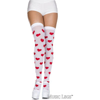 White thigh-high socks with red heart pattern worn by a person on a white background