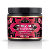 Jar of 'Honey Dust' kissable body powder with a pink and black label on a white background. strawberry dreams
