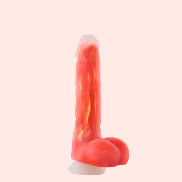Red and white dildo on a light pink background
