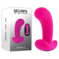 pink g spot curved vibrator with wide base bottom beside display box