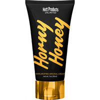 Horny Honey arousal cream packaging with gold text on a black background