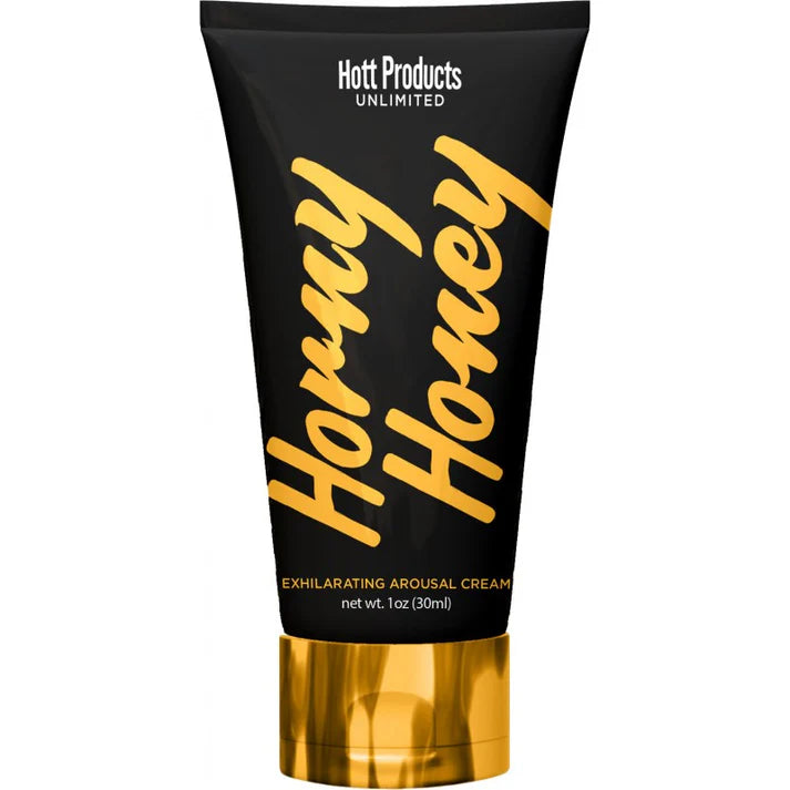 Horny Honey arousal cream packaging with gold text on a black background