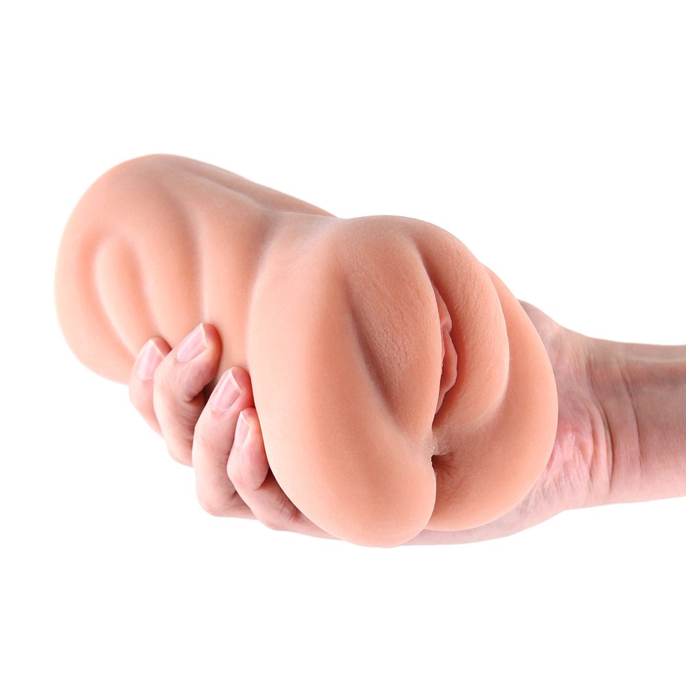 Hand holding a vagina & butt masturbator on a white background